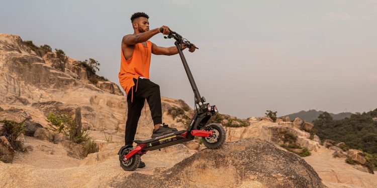 person riding on circooter bike