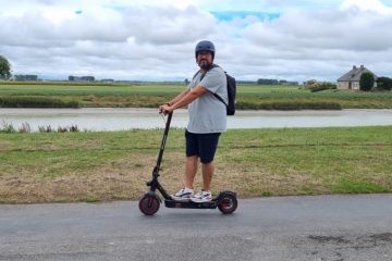 person riding on isinwheel scooter