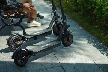 two scooters standing near