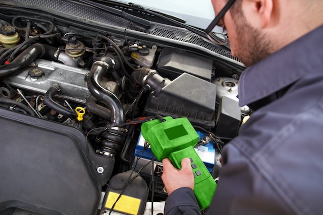 starting device for car in mans hands